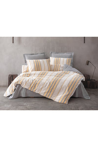 Set husă dublă de pilotă Husă de pilotă: 200 X 220 cm Cearșaf de pat: 240 X 260 cm Față de pernă: 50 X 70 cm (2 bucăți) Tribus - Galben